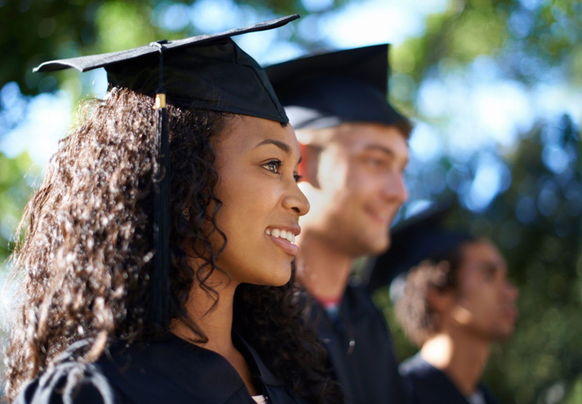 a smiling college graduate