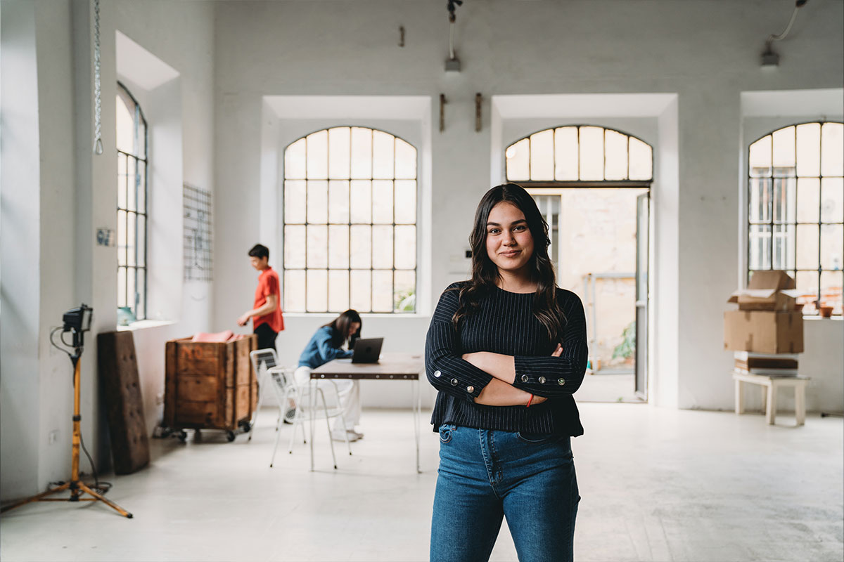 Young Woman Business Owner with Crossed Arms