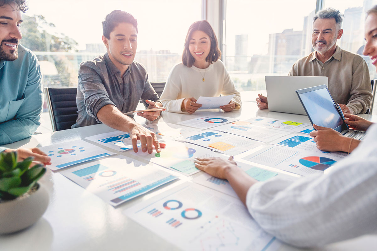 Business Meeting at Table with Documents